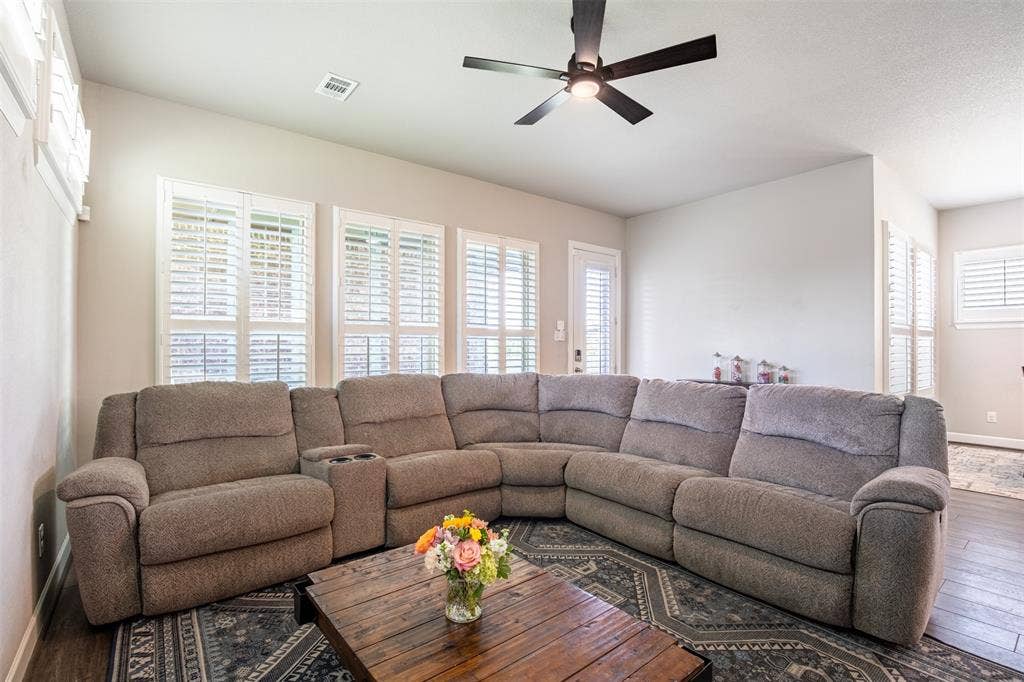 721 Matchbox Street, Argyle, TX 76226 Beautifully appointed room with custom plantation shutters offering abundant natural light and an airy, inviting atmosphere.