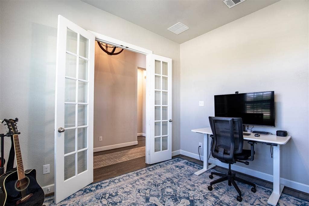 721 Matchbox Street, Argyle, TX 76226 Private office with french doors and durable flooring.