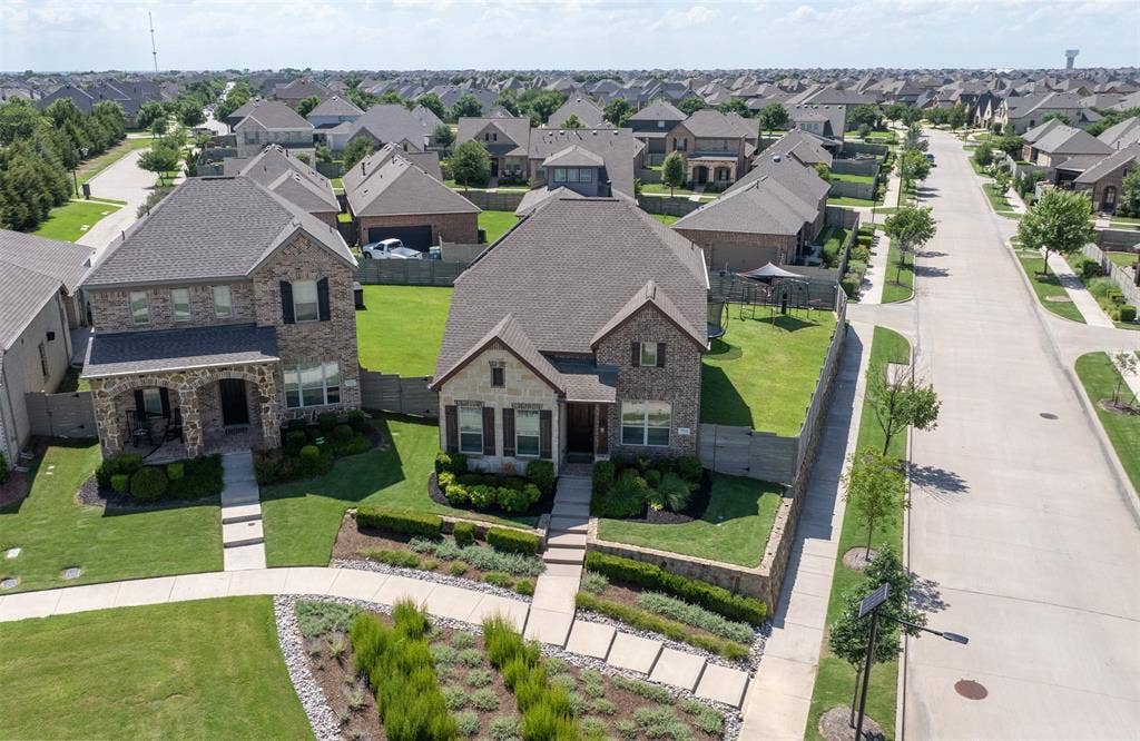721 Matchbox Street, Argyle, TX 76226 Very special elevated lot surrounded by green space.