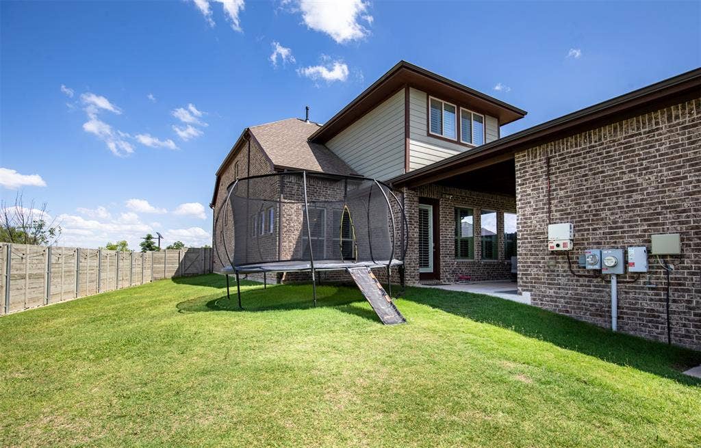 721 Matchbox Street, Argyle, TX 76226 This exceptionally large, elevated yard provides ample privacy.