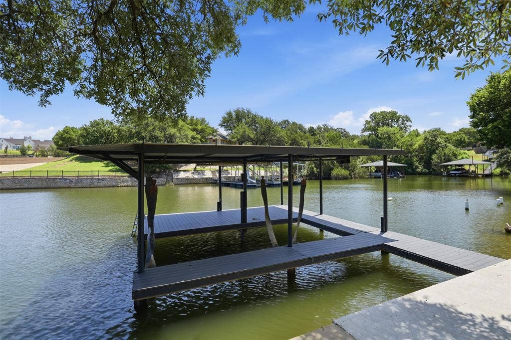 6107 Grande Cove Court, Granbury, TX 76049 boat dock with trex for less maintenance