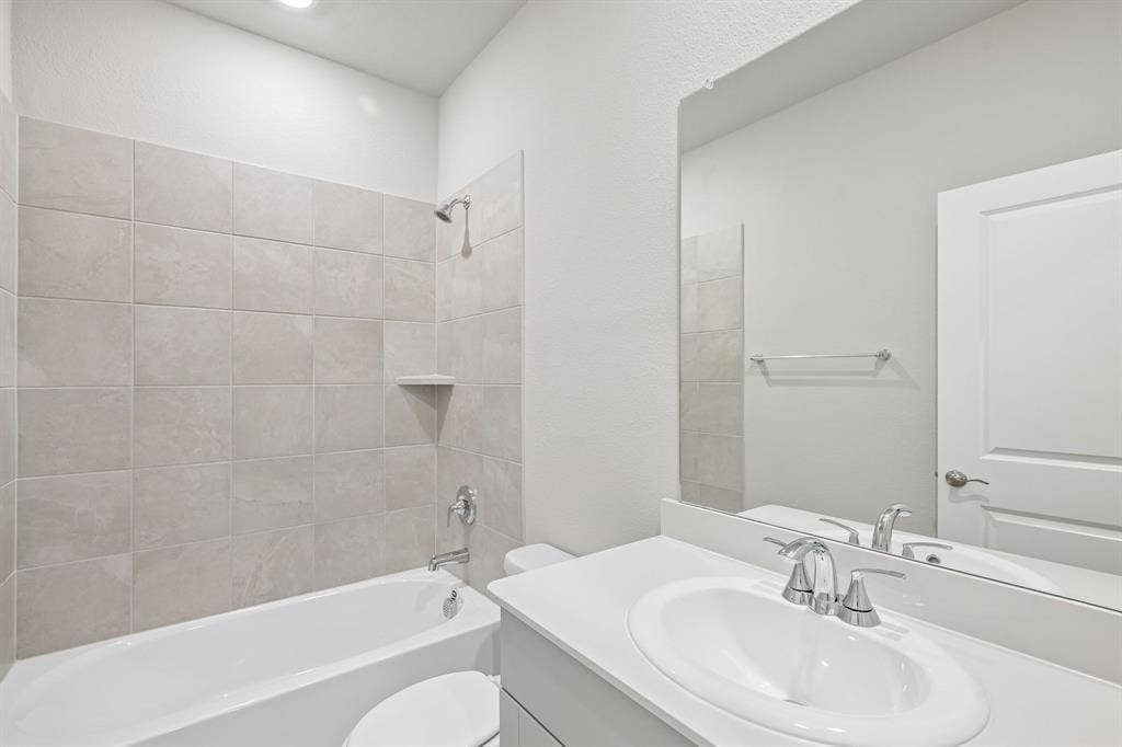 1934 Tradition Drive, Seagoville, TX 75159 Photo is not of the actual home, but is an inspirational photo of builder’s model home and may depict options, furnishings, and/or decorator features that are not included.