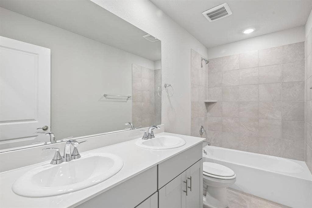 1934 Tradition Drive, Seagoville, TX 75159 Photo is not of the actual home, but is an inspirational photo of builder’s model home and may depict options, furnishings, and/or decorator features that are not included.