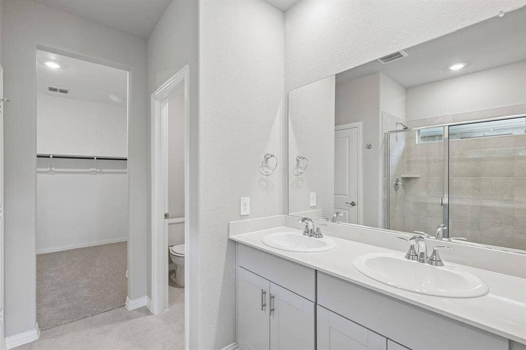 1934 Tradition Drive, Seagoville, TX 75159 Photo is not of the actual home, but is an inspirational photo of builder’s model home and may depict options, furnishings, and/or decorator features that are not included.
