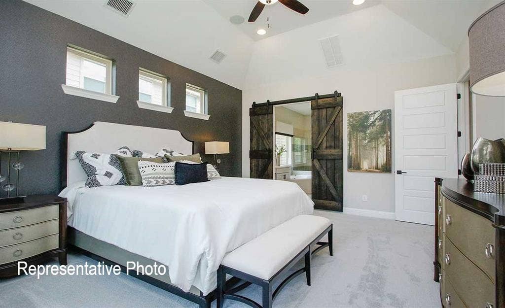 1324 Gardendale Hollow Lane, Anna, TX 75409 Spacious bedroom featuring vaulted ceilings, recessed lighting, and a ceiling fan