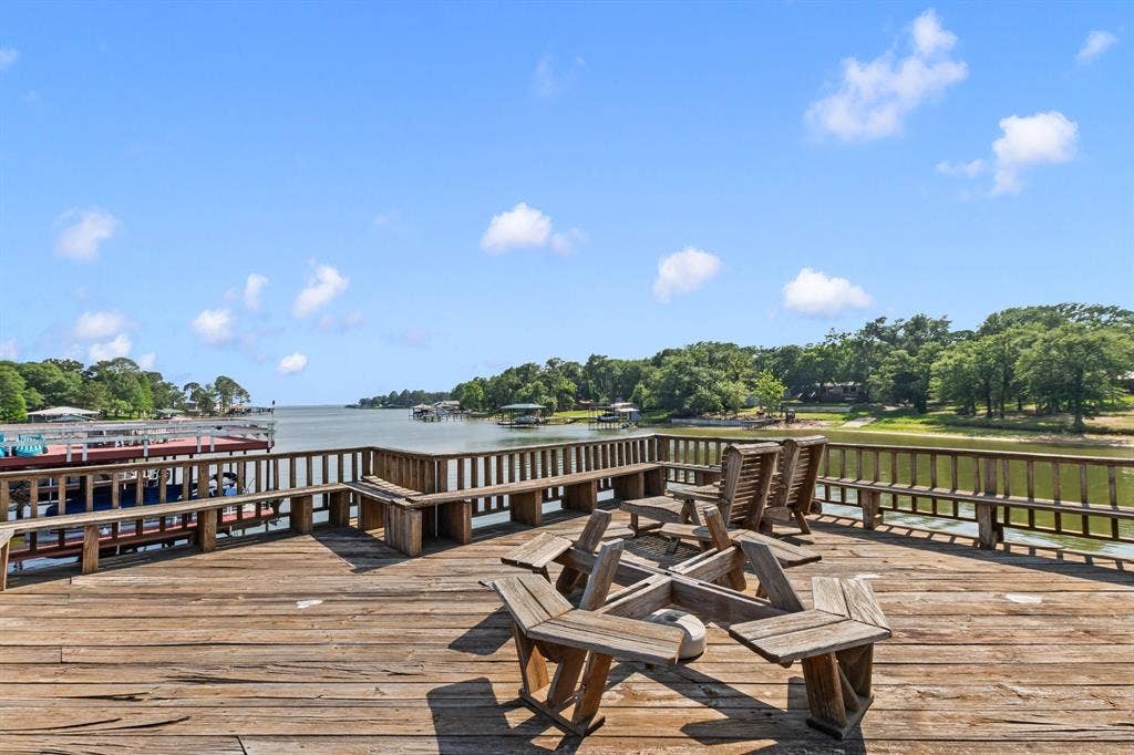 194 Bushwhacker Drive, Mabank, TX 75156 Elevated lakeside deck perfect for relaxing, entertaining, and enjoying the view.
