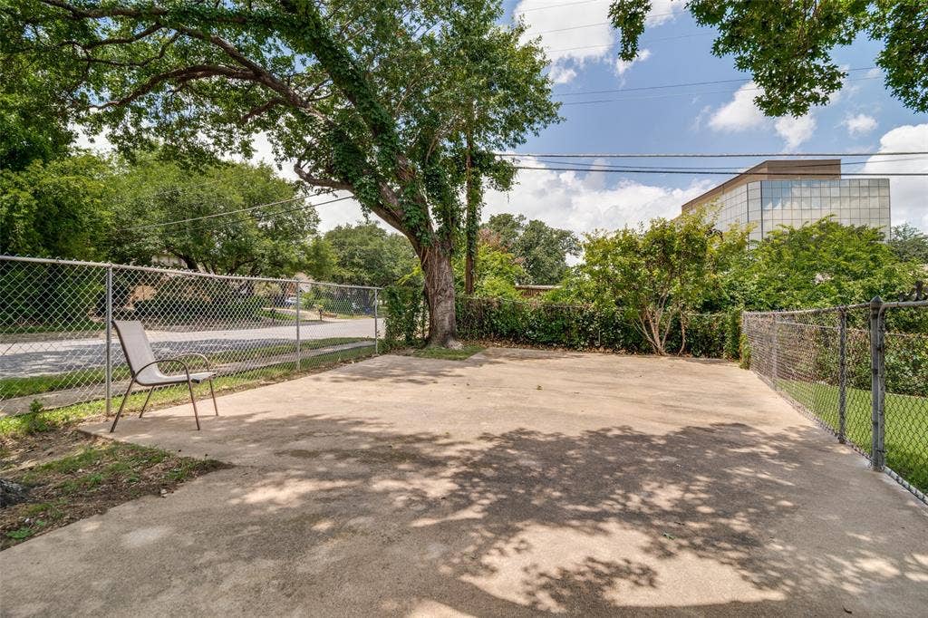 Fenced paved area