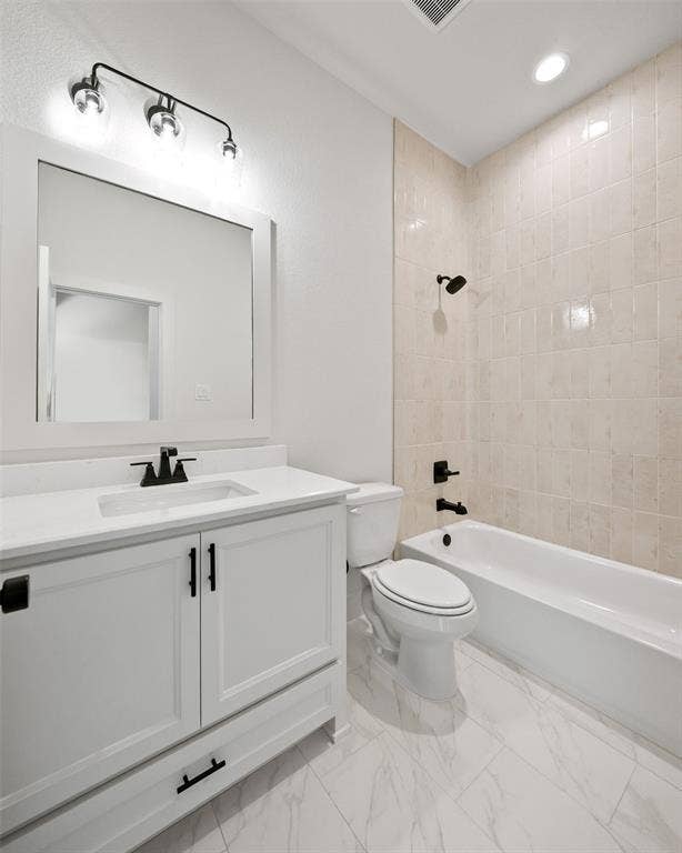 902 Boston Lane, River Oaks, TX 76114 Contemporary bathroom featuring a white vanity with a rectangular undermount sink, quartz countertop, and black hardware