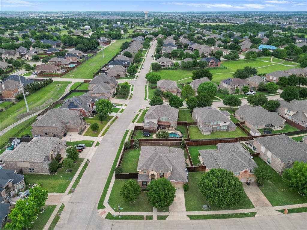 1621 Lakemere Drive, Prosper, TX 75078 Established residential neighborhood with a consistent architectural style, featuring mature trees and green spaces