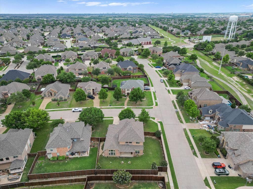 1621 Lakemere Drive, Prosper, TX 75078 Aerial perspective showcasing a residential neighborhood with numerous single-family homes