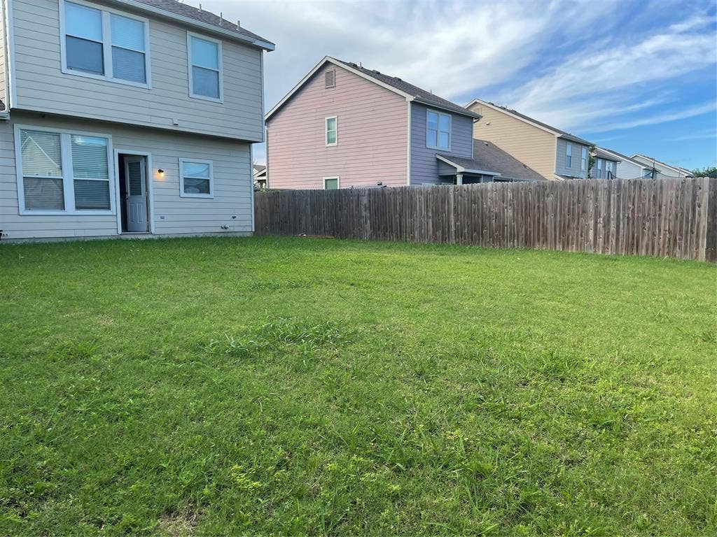 817 Greene Way, Wylie, TX 75098 Expansive grass backyard with a wood privacy fence