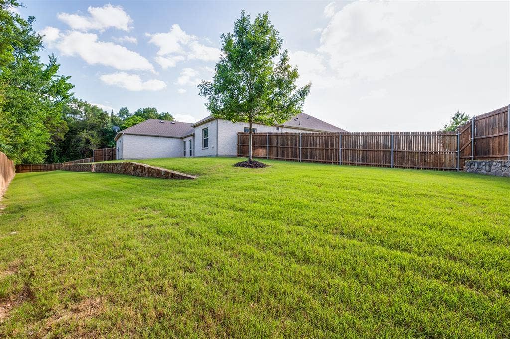 824 State Street, DeSoto, TX 75115 Massive pool sized back yard. Professional renderings are available.