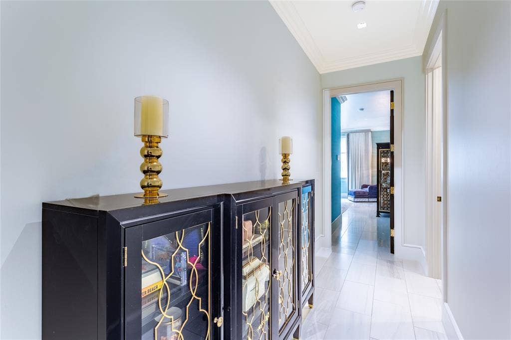 2300 WOLF Street, #5D, Dallas, TX 75201 Hall leading to Laundry & Primary Bedroom.