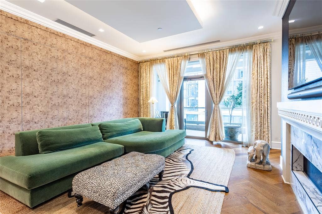 2300 WOLF Street, #5D, Dallas, TX 75201 Den has a wall of closets, Balcony access.