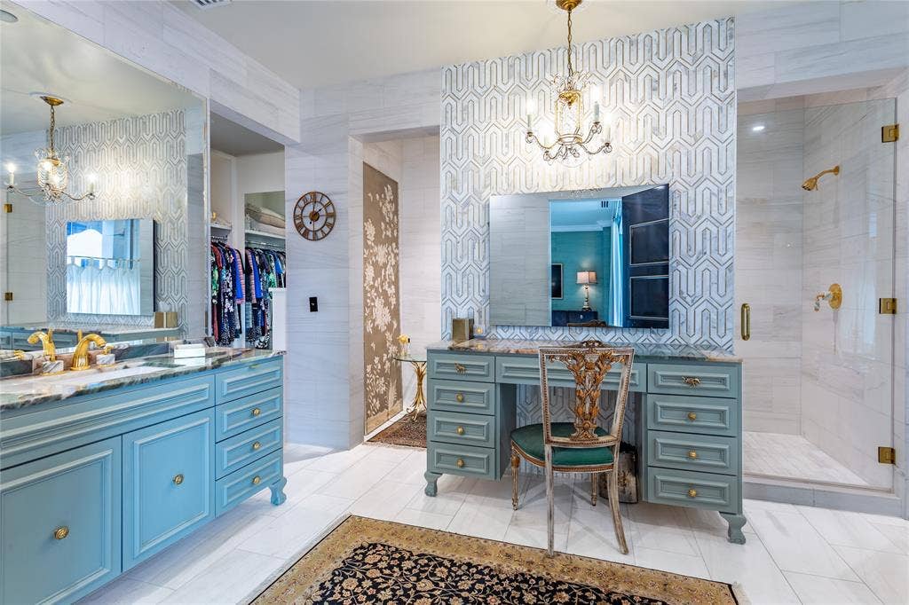 2300 WOLF Street, #5D, Dallas, TX 75201 Custom enamel cabinets & make-up desk with TV in the mirror.