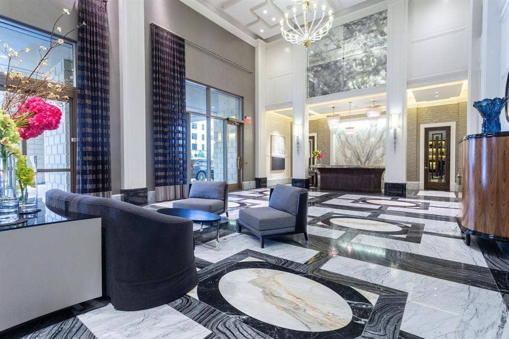 2300 WOLF Street, #5D, Dallas, TX 75201 Two-story Lobby facing the Concierge desk and mail room.