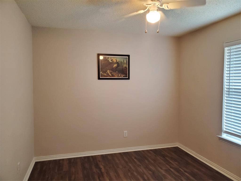 5005 Boxwood Lane, McKinney, TX 75070 2nd bedroom. No carpet! Some network/phone wiring.