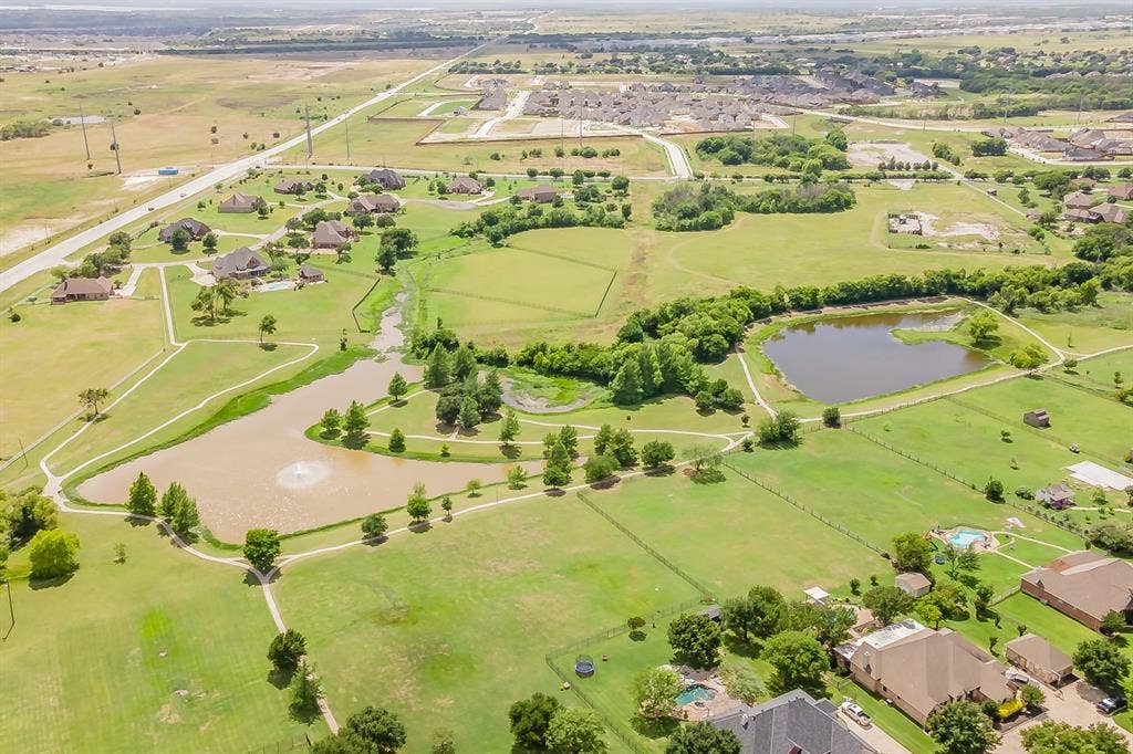 Wonderful neighborhood common area with open space, two ponds, and walking paths throughout the neighborhood.   Community also has its own playground and pool w/covered cabana