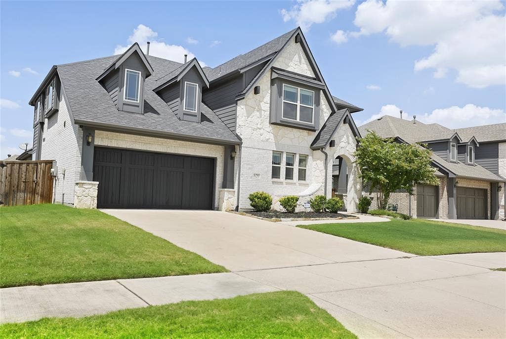 620 Shadow Trail, Frisco, TX 75033 Contemporary two-story residence featuring a combination of light-colored brick and stone veneer