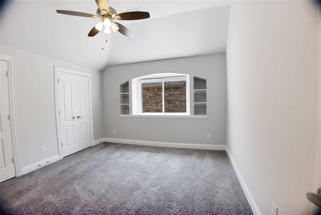 620 Shadow Trail, Frisco, TX 75033 Room featuring neutral-toned walls, gray carpeting, and a ceiling fan with integrated lighting
