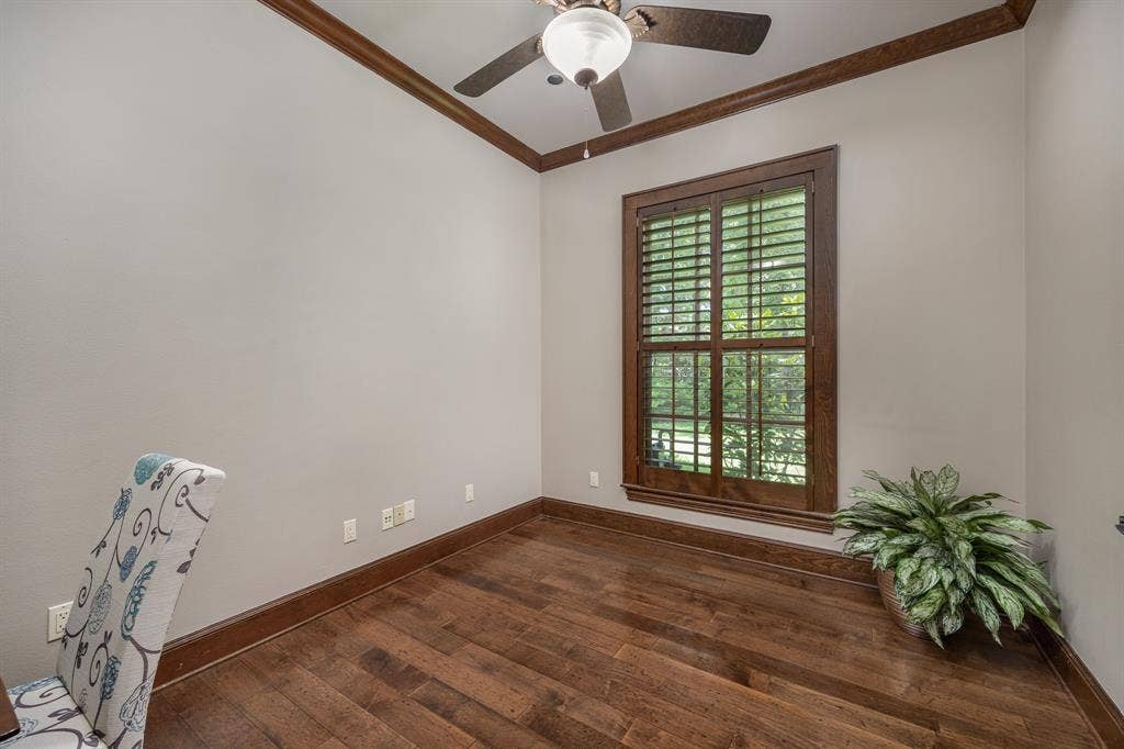 1915 Stonegate Valley Drive, Tyler, TX 75703 Featuring wood flooring, ceiling fan and window with plantation shutters