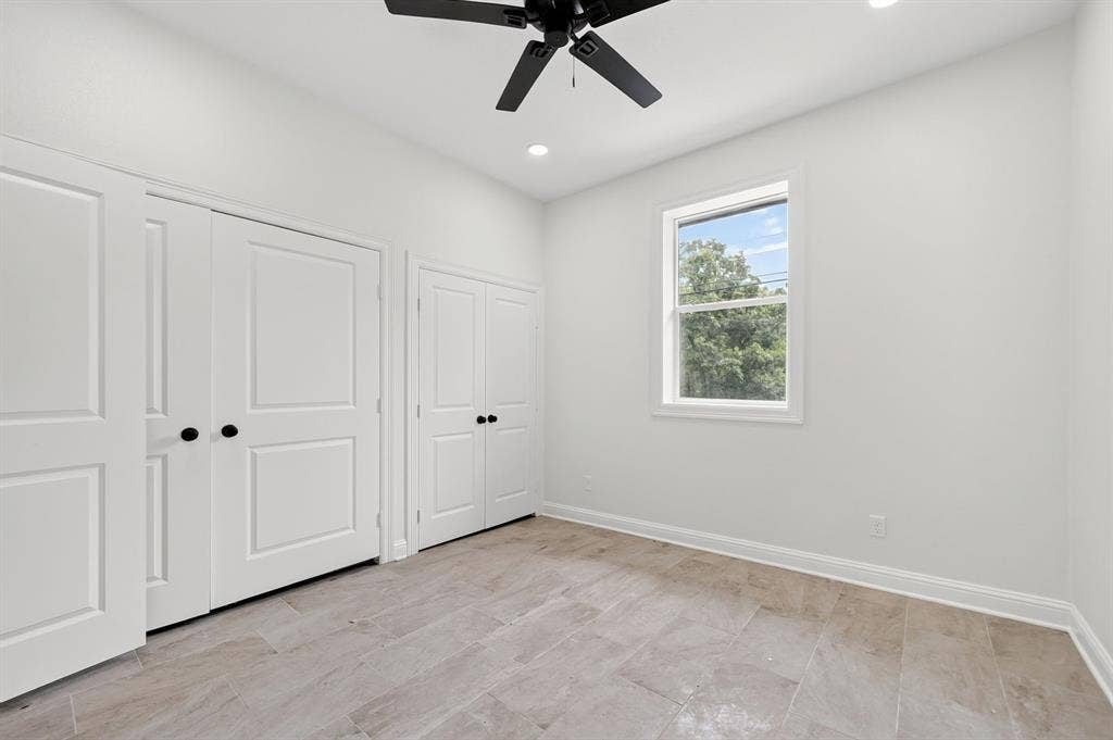 608 Bunny Rabbit Road, Athens, TX 75751 Bright interior space featuring light-toned flooring, white walls, and a ceiling fan