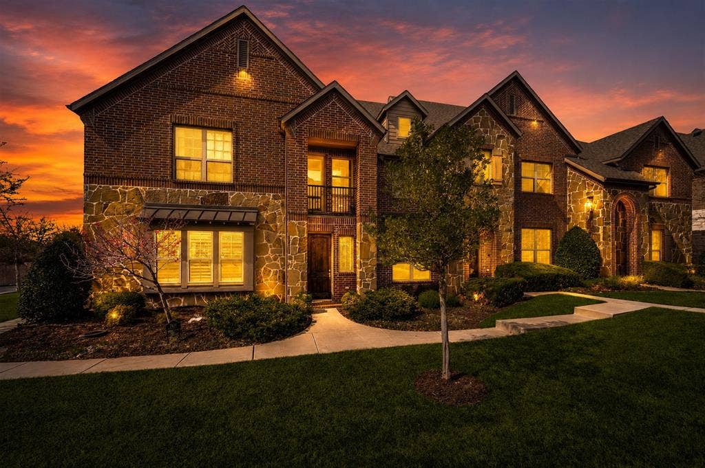 7424 Mitchell Drive, McKinney, TX 75070 Brick and stone-clad exterior with multiple gables
