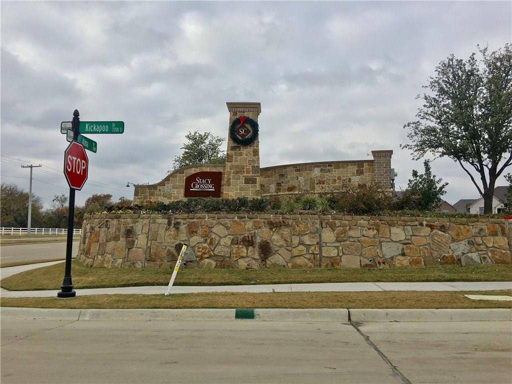 7424 Mitchell Drive, McKinney, TX 75070 Community entrance sign for the McKinney Texas townhome neighborhood surrounding 7424 Mitchell Drive, showcasing an established residential subdivision with attractive stone monument sign, tree lined streets, and convenient North Texas location near McKinney shopping, restaurants, schools, medical facilities, and DFW commuter access.