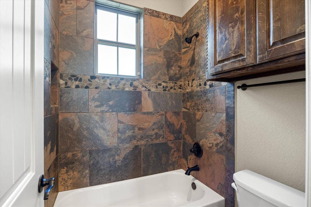 104 Rattling Antler Court, Azle, TX 76020 Separate water closet in shared bathroom.