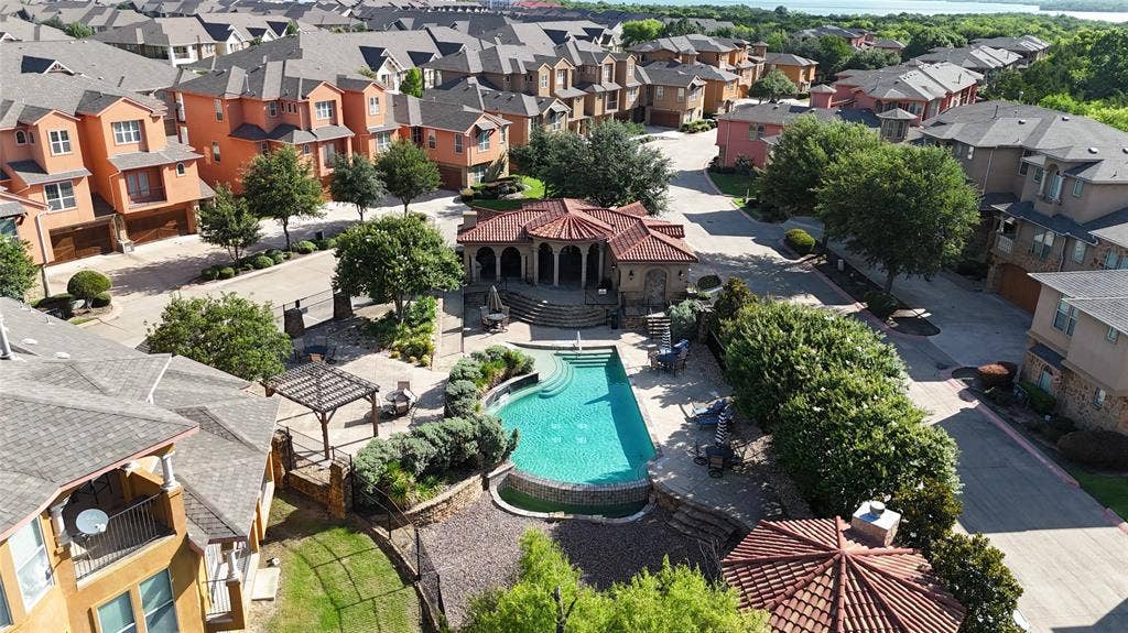 7310 Venice Drive, #4, Grand Prairie, TX 75054 Community pool with integrated spa and surrounding paved deck