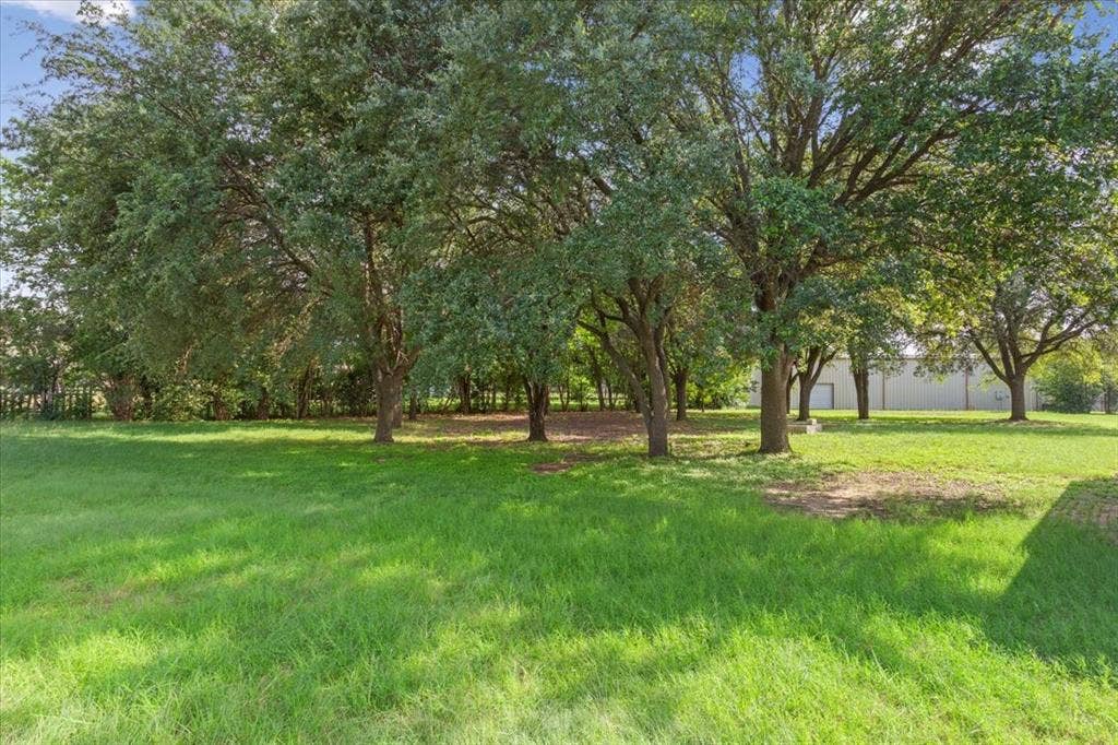 1084 Speegle Road, Woodway, TX 76712 Street View West Yard