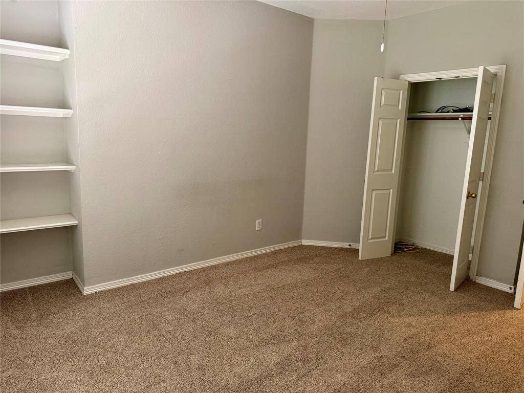 4309 Wingren Drive, Plano, TX 75093 Guest bedroom down can be office with built in shelves