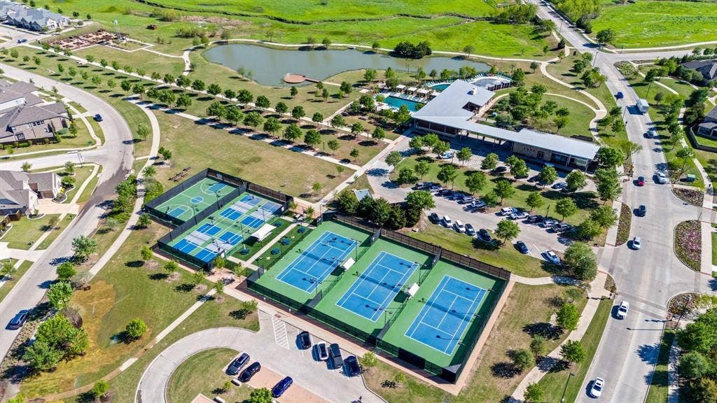 3930 Dalea Drive, Prosper, TX 75078 Expansive community recreation area featuring multiple tennis courts, pickleball courts, and a basketball court