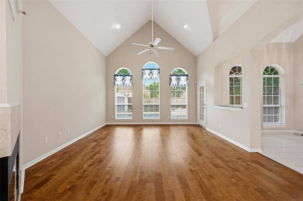 2228 Amy Lane, Plano, TX 75074 Formal Living Room with vaulted ceilings viewing the Pool and open to the kitchen