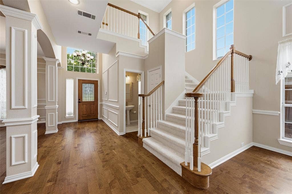 2228 Amy Lane, Plano, TX 75074 Large Entry Hall with steps to second floor - beautiful flooring - Two Story ceilings