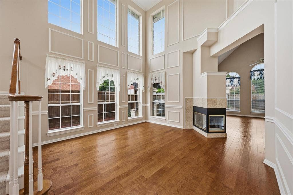 2228 Amy Lane, Plano, TX 75074 Another view of the office space with shared gas fireplace - 2 story ceilings