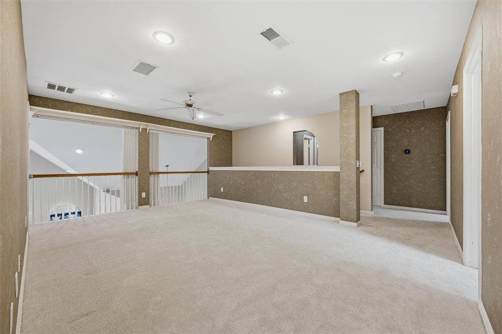 2228 Amy Lane, Plano, TX 75074 large multipurpose game room, media room - blinds can close to the room below - corner closet - 2nd stairway behind the half wall