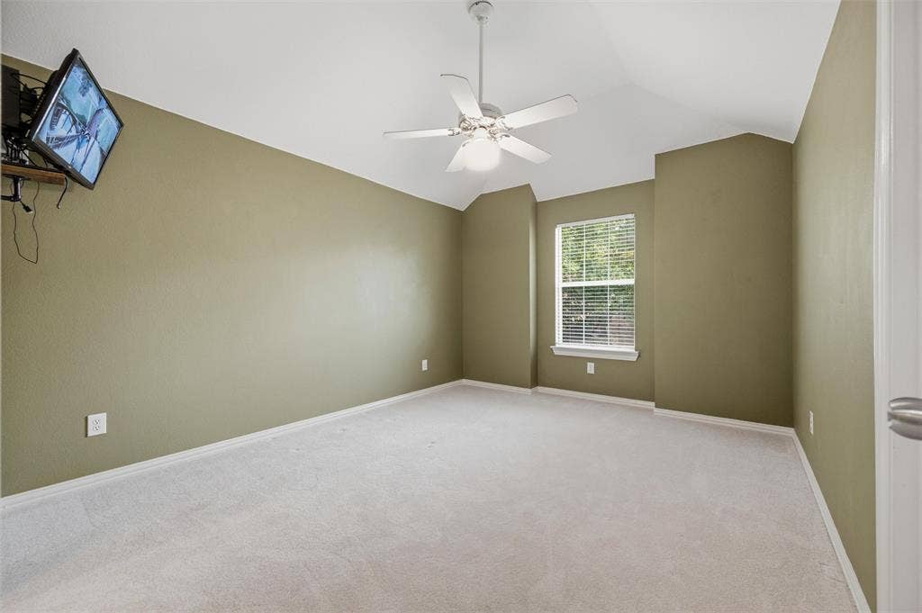 2228 Amy Lane, Plano, TX 75074 2nd floor bedroom with mounted TV and camera to outside - walk in closet - view front street JACK N JILL BATH