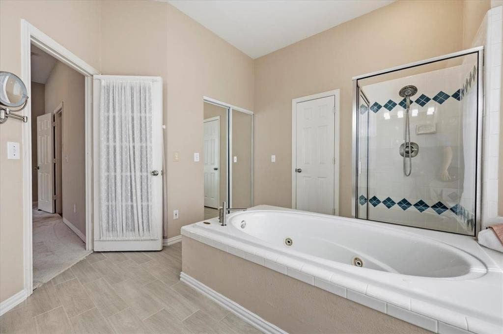 2228 Amy Lane, Plano, TX 75074 DOOR TO MASTER BEDROOM - SLIDING GLASS DOORS TO HUGE CLOSET - DOOR TO THE COMODE ROOM - NEE TILE FLOORING