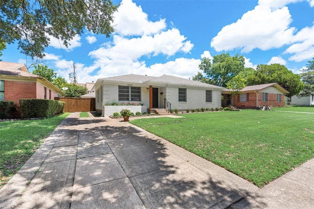 2523 San Medina Avenue, Dallas, TX 75228 White brick facade with dark trim windows