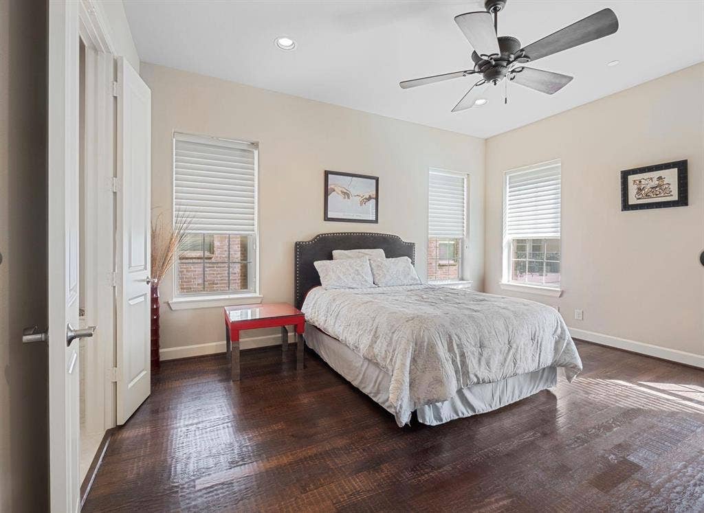 5001 Meridian Lane, #2103, Addison, TX 75001 Spacious room featuring rich wood-finish flooring, recessed lighting, and a ceiling fan