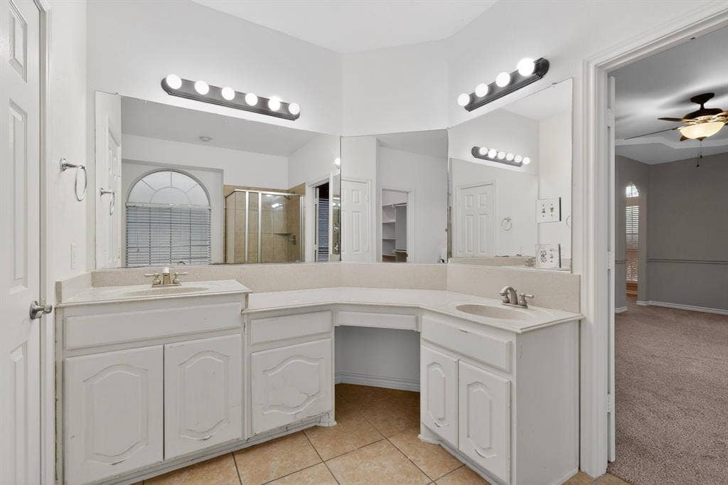 217 Gatehouse Drive, Red Oak, TX 75154 The primary bathroom also has tile floors.