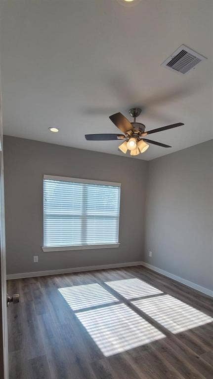9114 Caddo Road, #A & B, Houston, TX 77078 Bedroom 4 - featuring vinyl flooring, a window with horizontal blinds, recessed lighting, and a ceiling fan with integrated light