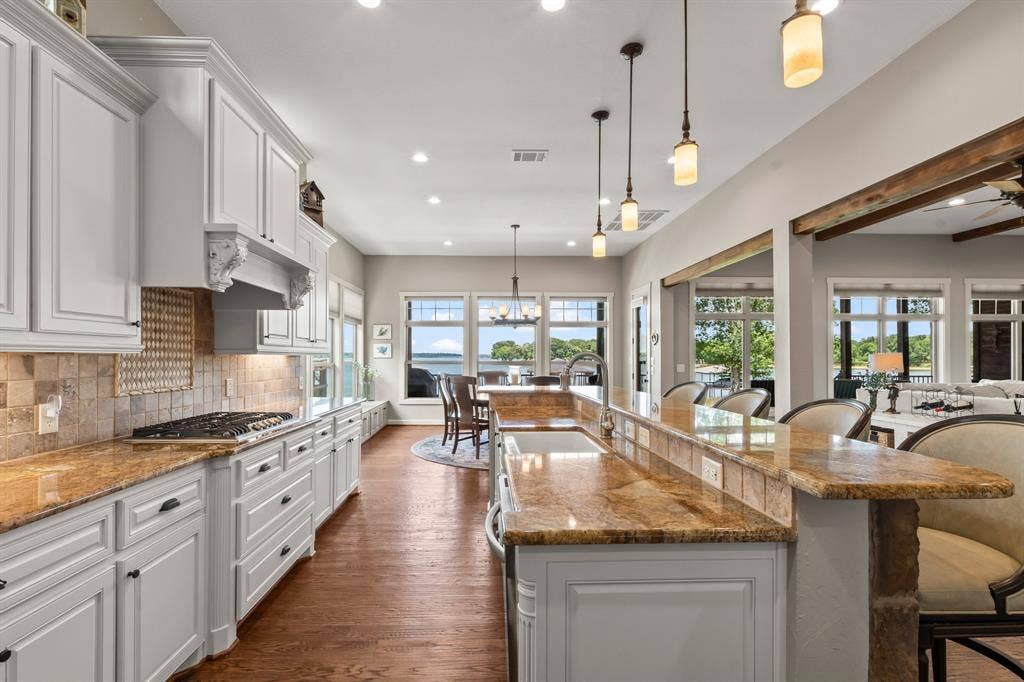 229 N Beverly Drive, Malakoff, TX 75148 Gas cooktop with built-in oven and microwave.