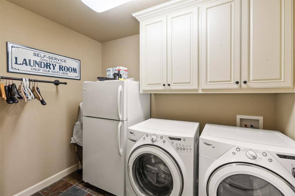 229 N Beverly Drive, Malakoff, TX 75148 Large utility room with extra fridge.