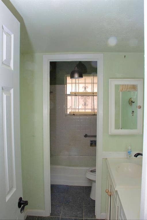 1630 Indian Summer Trail, Dallas, TX 75241 Bathroom entry featuring a vanity with an integrated sink and mirror