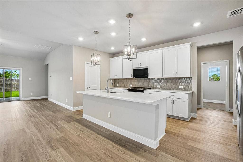 1316 Bridgestone Drive, Princeton, TX 75071 Photo is not of the actual home, but is an inspirational photo of builder’s model home and may depict options, furnishings, and/or decorator features that are not included.