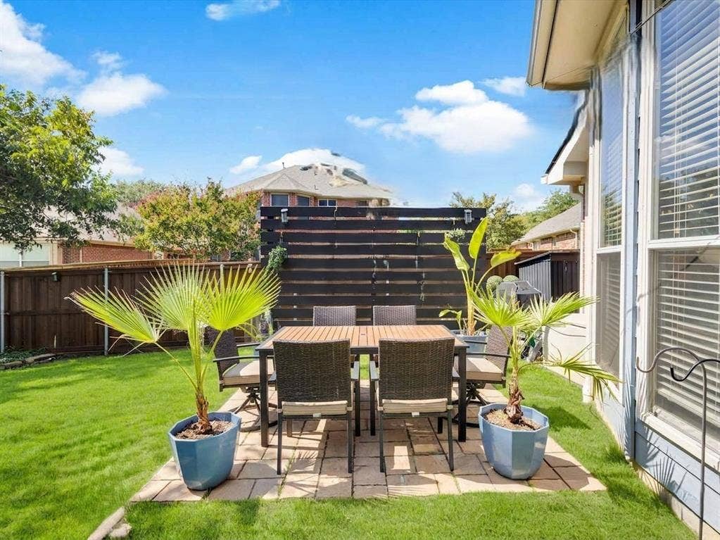 6004 Crestmill Lane, Sachse, TX 75048 Virtual rendering with patio set instead of hot tub.