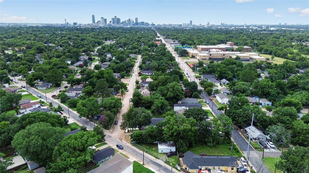 5130 Echo Avenue, Dallas, TX 75215 Aerial perspective showcasing a residential area with extensive tree canopy