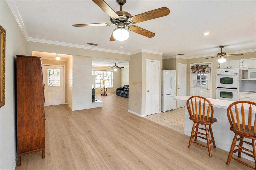 11608 State Highway 19 N, Athens, TX 75752 Dining room virtually staged to show example of possible new floors with flooring allowance